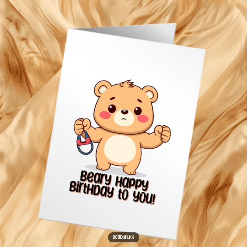Funny Free Printable Birthday Card: A proud Kawaii bear cub flexing with a colorful resistance band, showing off strength.